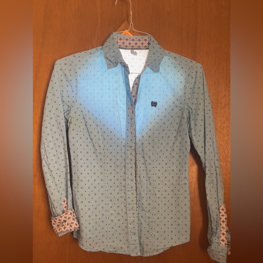 Cinch women’s button down rodeo shirt.